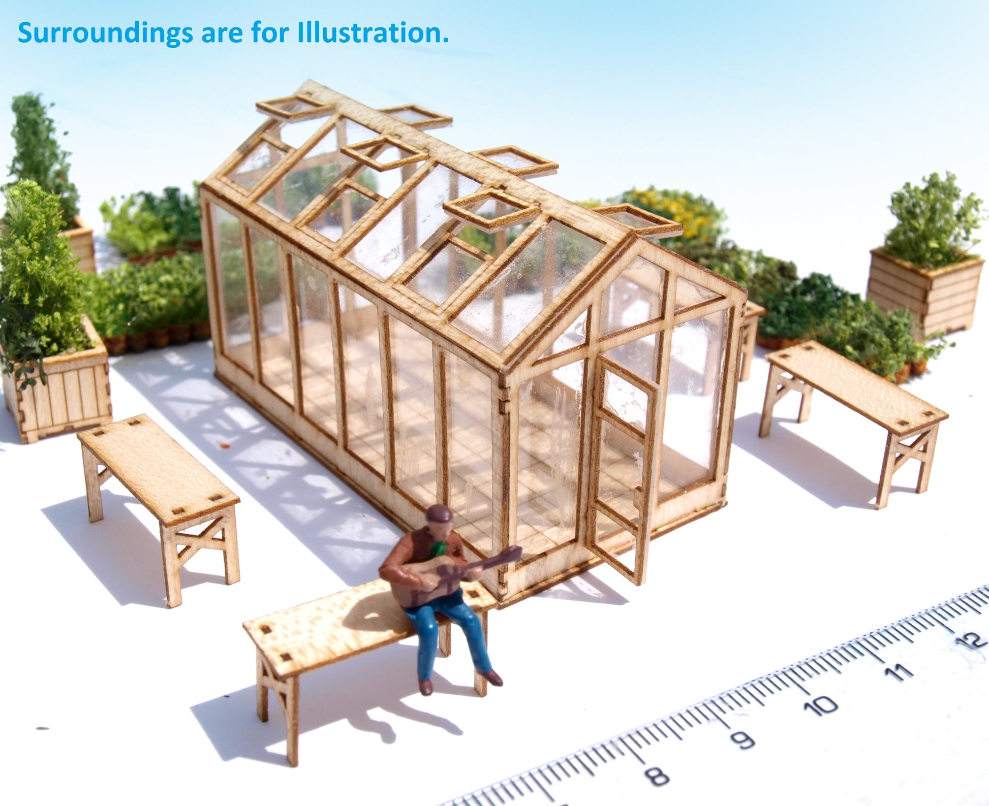 naaron88 miniature laser cut greenhouse building kit, unbuilt, unassembled. Ideal for HO scale hothouse dioramas. The additional greeneries are for illustration.